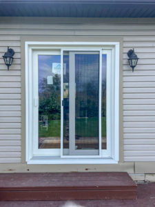 Image of a stylish screen door and EcoTech patio door, showcasing modern design and functionality for enhanced outdoor living spaces