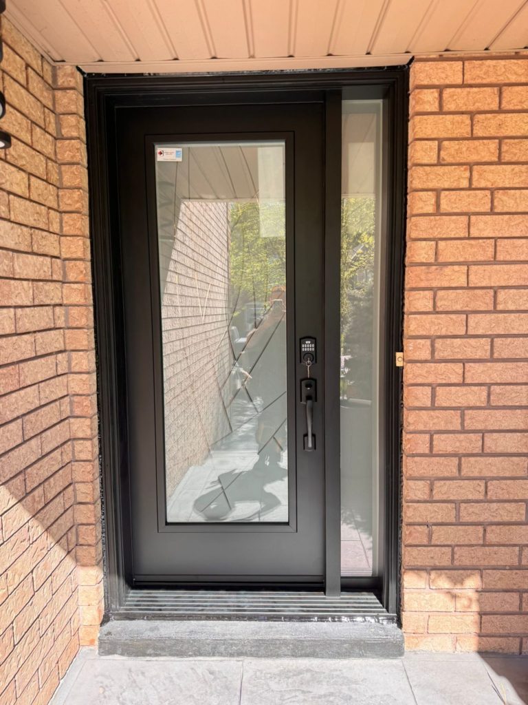 EcoTech's black door with privacy glass and side light, showcasing the company's high-quality window and door offerings