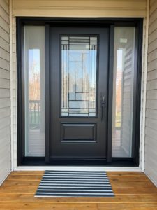 A black door with privacy glass for natural light on sides and on door