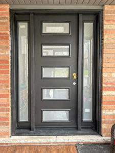 A sleek black door with privacy glass