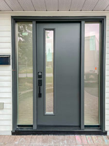 A sleek black door with privacy glass,