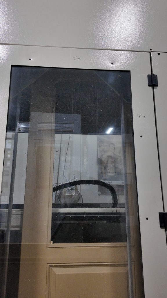 Computer-assisted machinery accurately cuts and prepares entry doors based on inputted measurements.