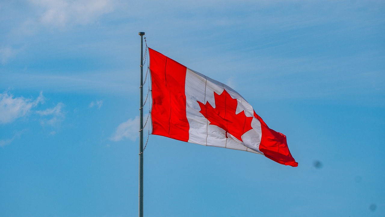 A Canadian flag on a bright day.